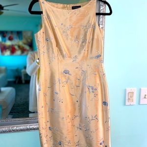 Champagne gold cocktail dress with blue embroidered accents. Like new